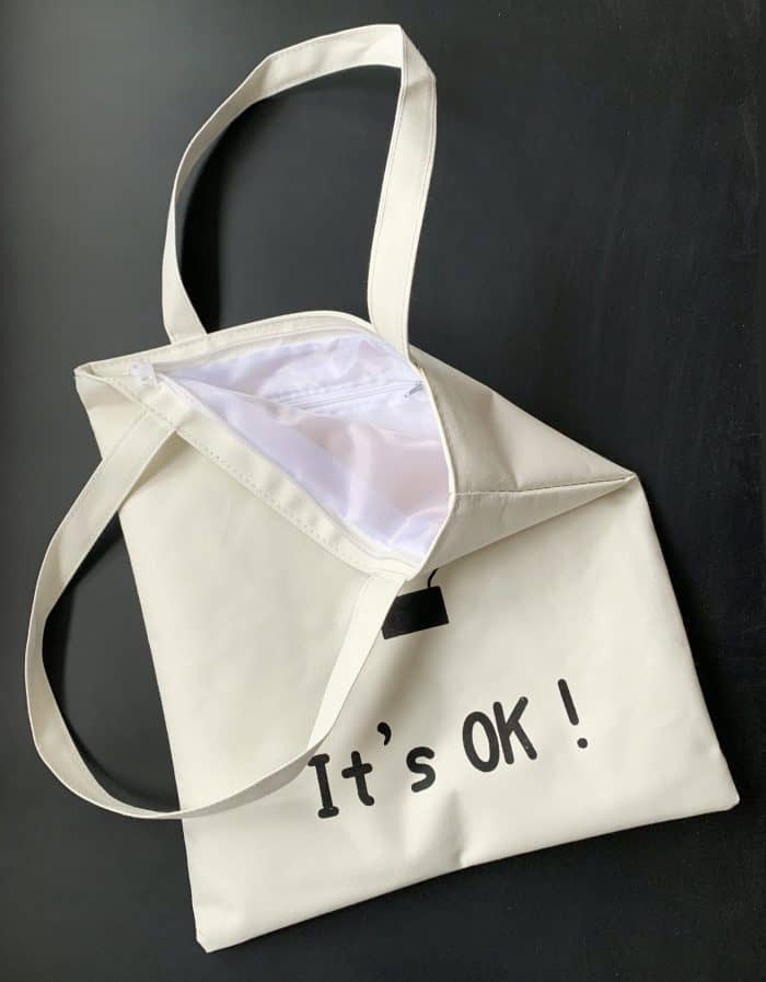 zip_canvas_bag_ok_details canvas bag with ok pattern details